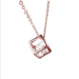 Rose gold cube necklace with cubic zirconia